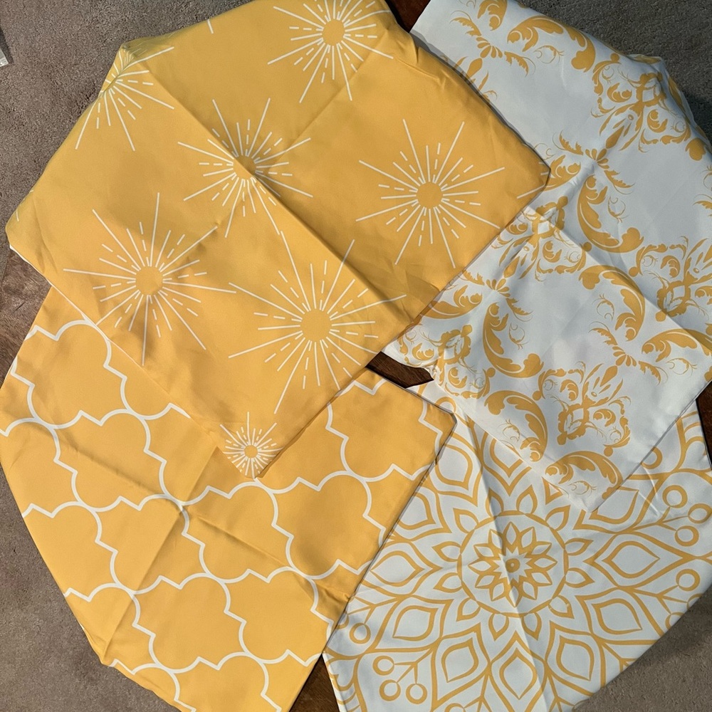 Yellow and white pillow covers